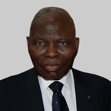 Dr. Christopher Kolade (CON)